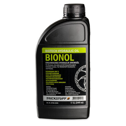 Black one-litre bottle of Trickstuff Bionol brake fluid with a green label.
