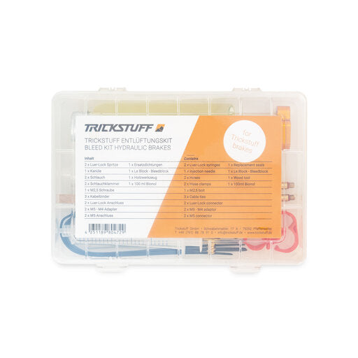 Trickstuff brake bleed kit in a clear compartment case with a printed contents label.
