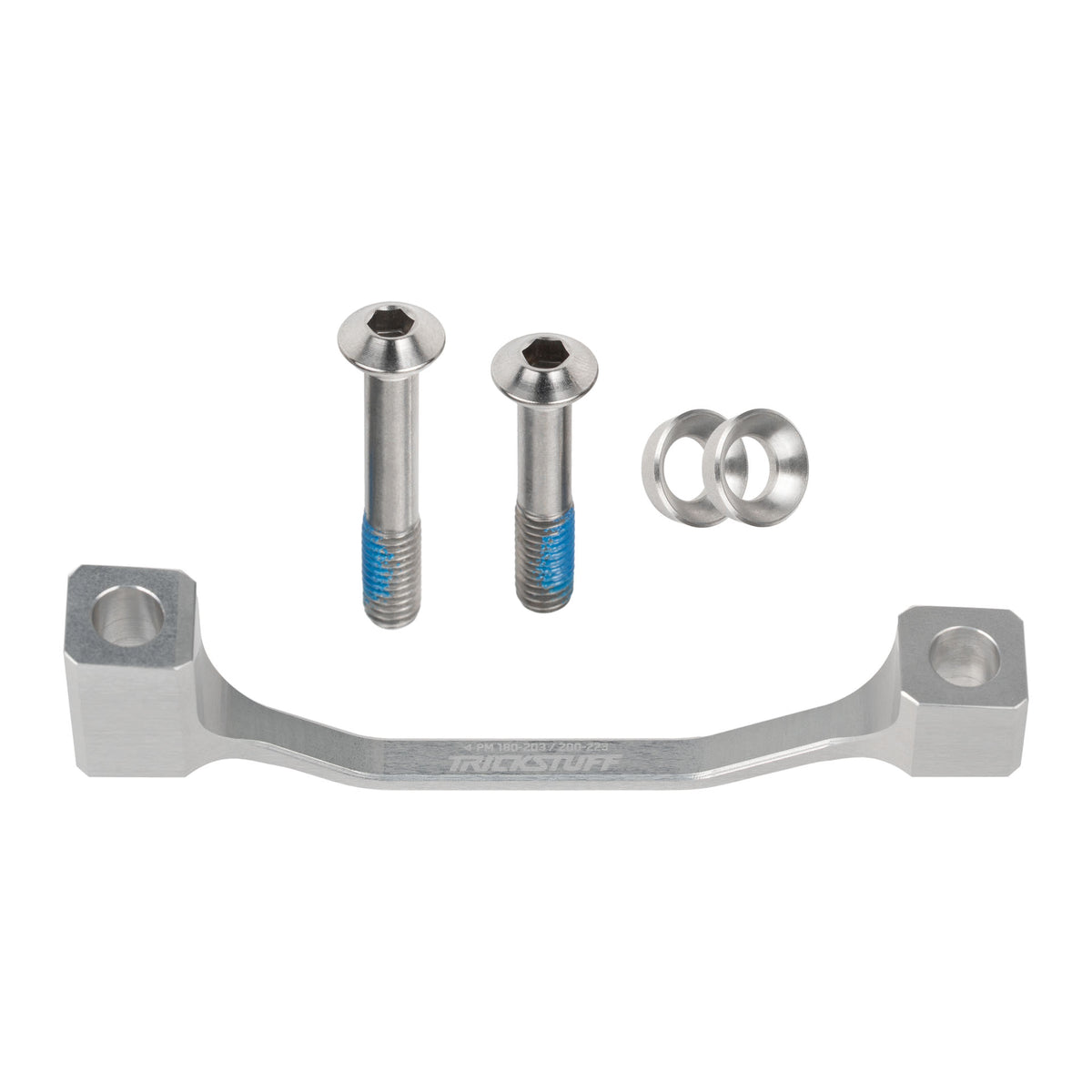 Silver Trickstuff post-mount brake adaptor with mounting bolts and washers.