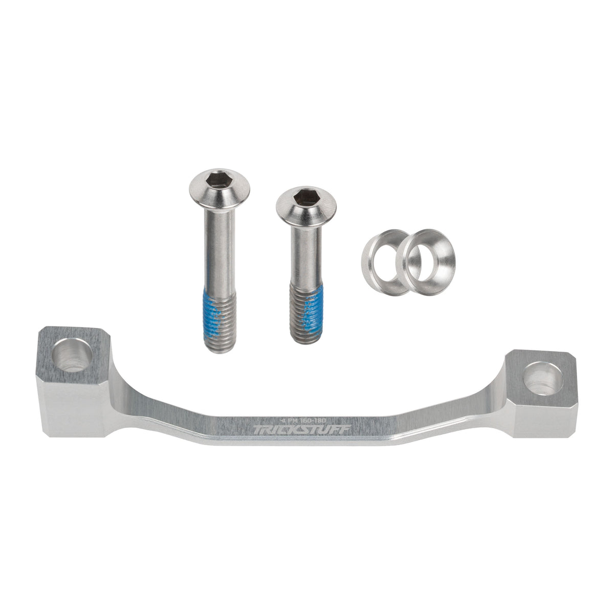Silver Trickstuff post-mount brake adaptor with mounting bolts and washers.