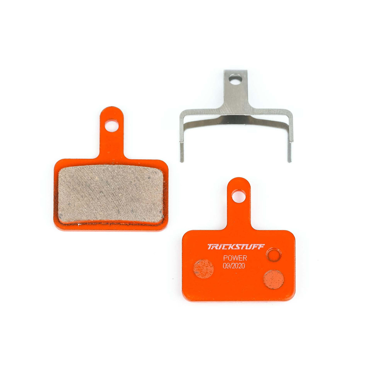 Trickstuff Power 240 brake pads, showing friction and backing faces with a retaining spring.