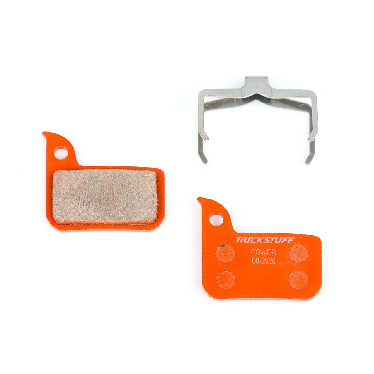 Trickstuff Power 860 brake pads, showing friction and backing faces with a retaining spring.