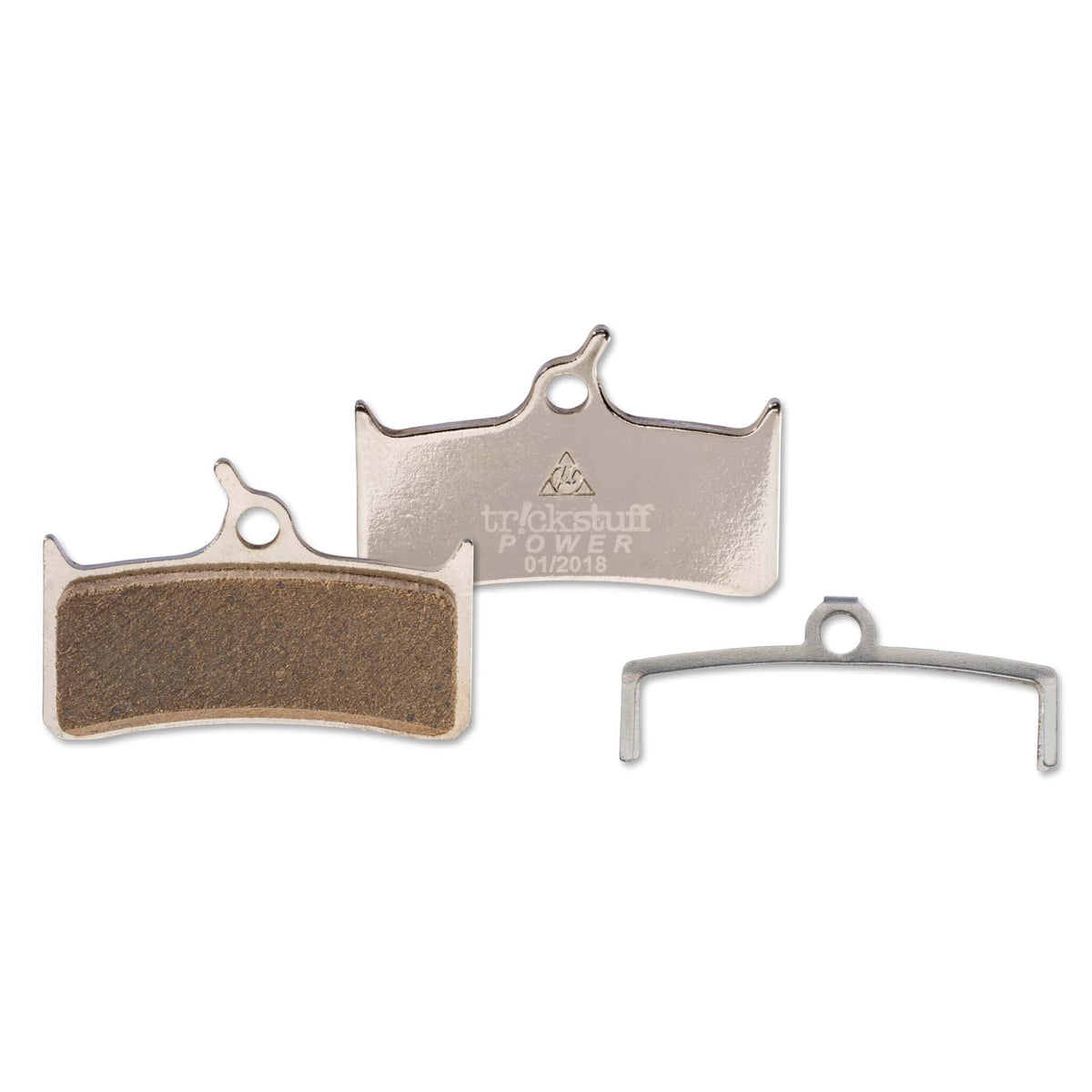 Trickstuff Power+ 220 brake pads, showing friction and backing faces with a retaining spring.
