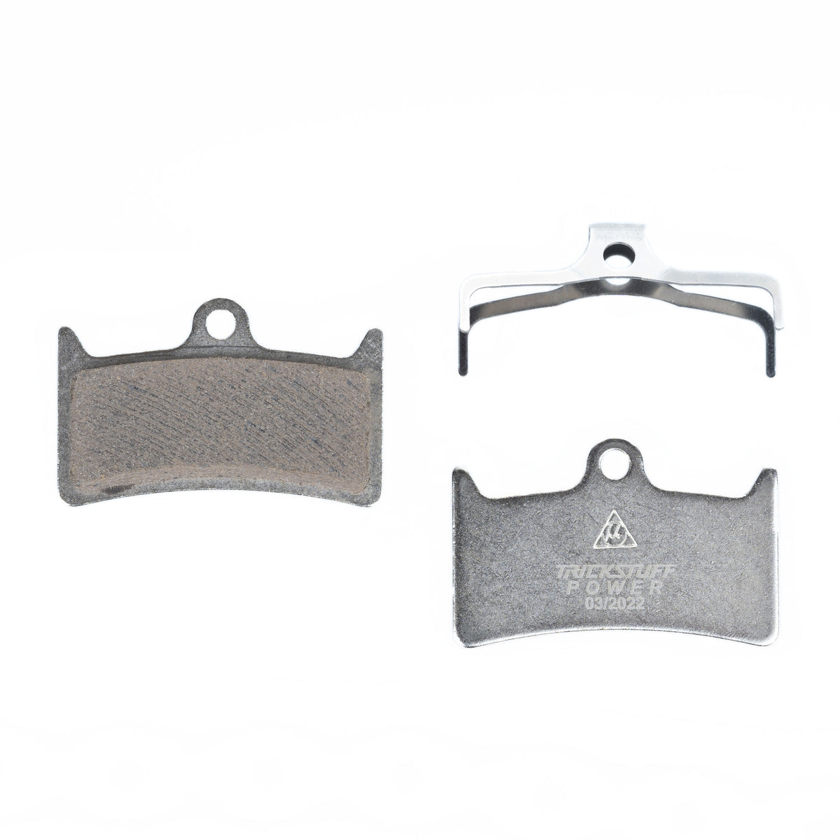 Trickstuff Power+ 730 brake pads, showing friction and backing faces with a retaining spring.