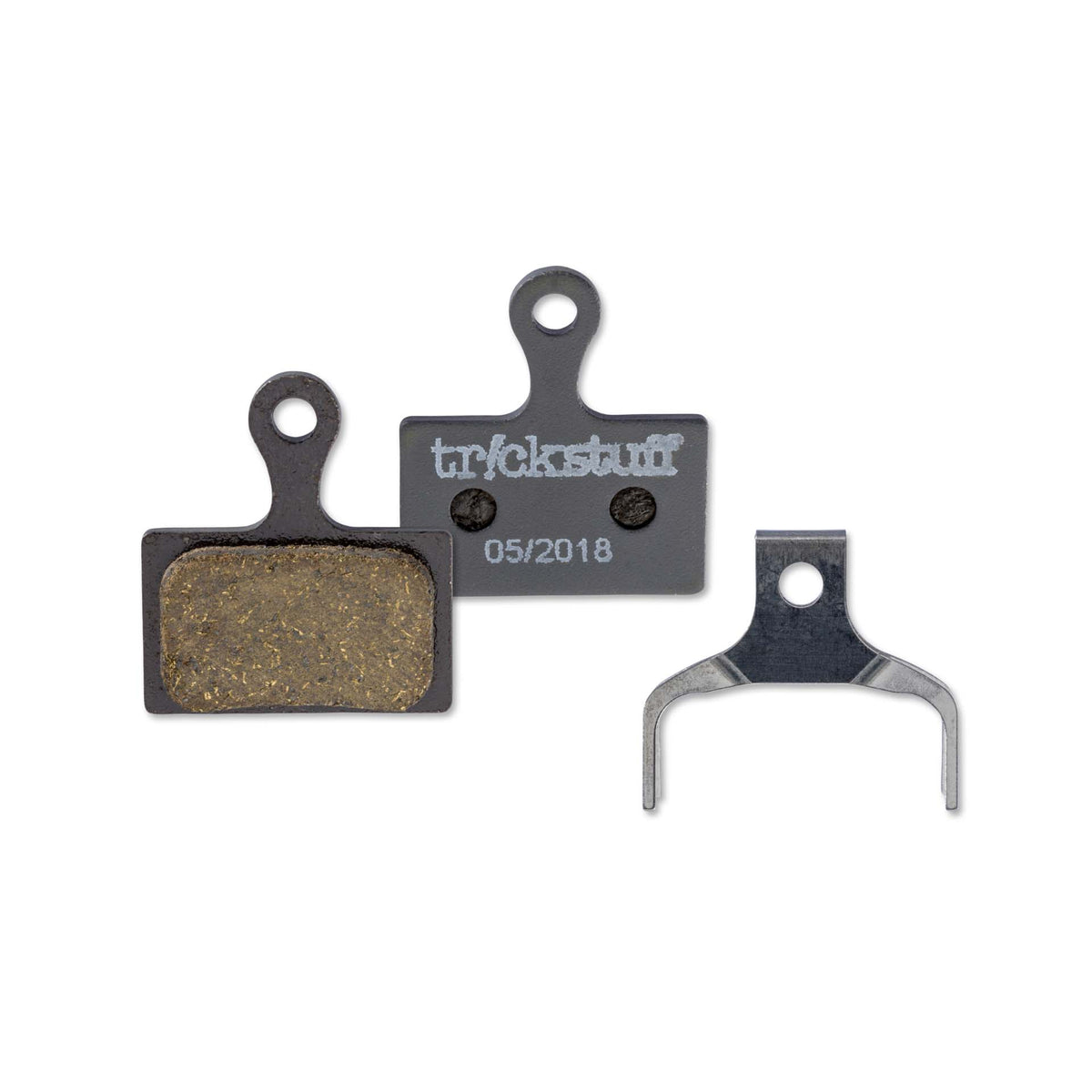 Trickstuff Standard 270 brake pads, showing friction and backing faces with a retaining spring.