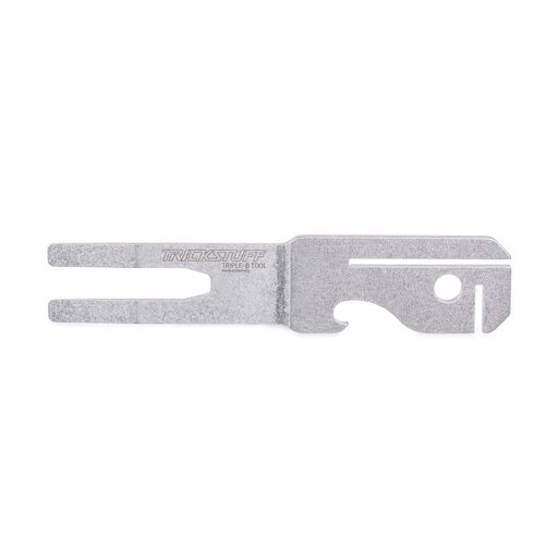Flat silver Trickstuff Triple-B Tool MKII with notched ends and cut-outs.